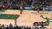 Giannis dunks over three Raptors