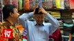 Dr Mahathir and wife shop for Raya treats