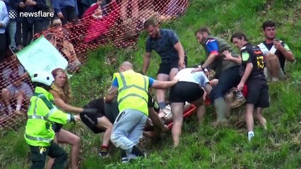 Suspected broken ankle among injuries sustained at Gloucestershire's Cheese Rolling event, UK
