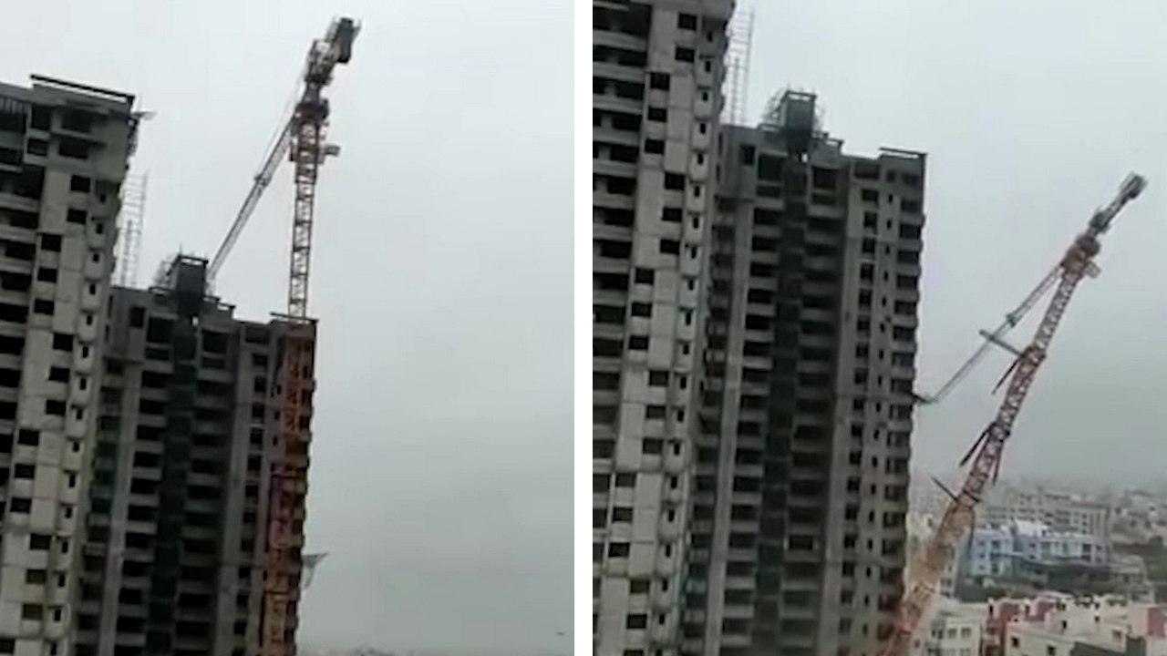 Une grue s'effondre sur des habitations après le passage d'une cyclone en Inde