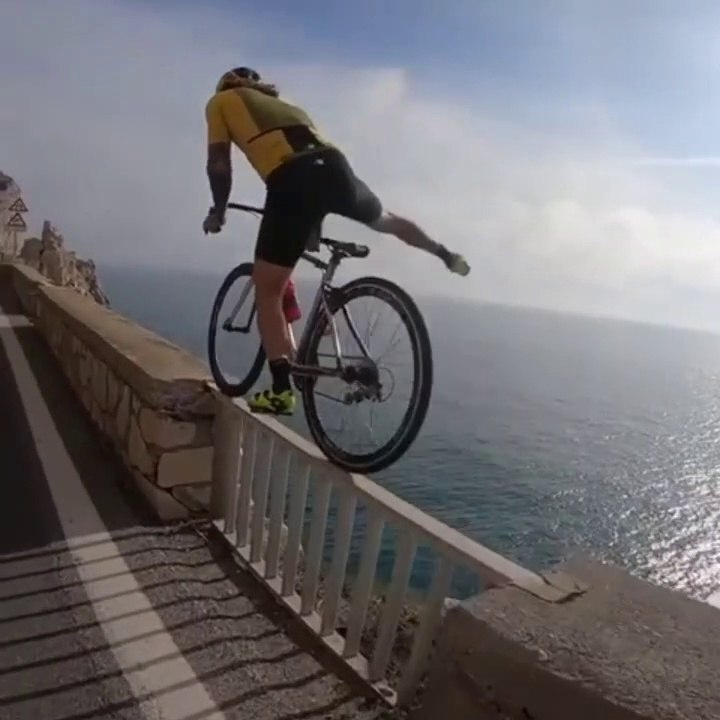 Riding a bicycle near the river!!!OMG