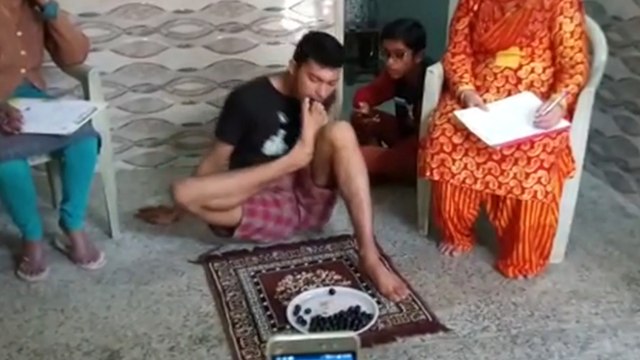 19-year-old sets world record by eating 65 grapes in three minutes – using his foot