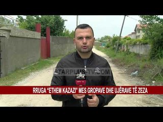 RRUGA “ETHEM KAZAZI” MES GROPAVE DHE UJËRAVE TË ZEZA