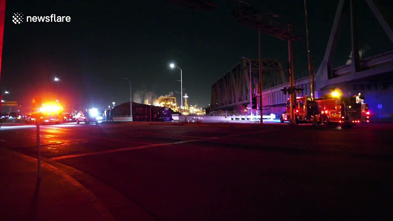 Overturned semi-truck blocks bridge near Los Angeles