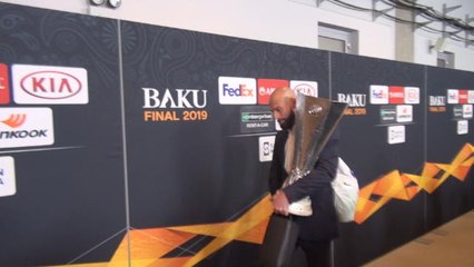 Download Video: Caballero leaves stadium with Europa League trophy