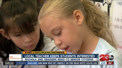 2nd graders read to seniors