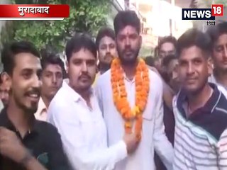 RSS कार्यकर्ता ने माउंट एवरेस्ट की चोटी पर तिरंगे के साथ फहराया भगवा झंडा