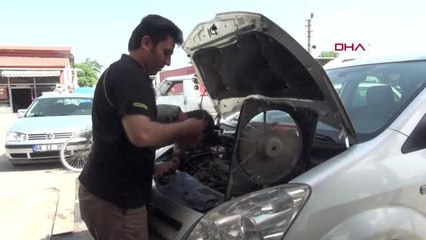 AKSARAY SICAKTAN BUNALAN TAMİRCİ, ARAÇ FANIYLA SERİNLEDİ