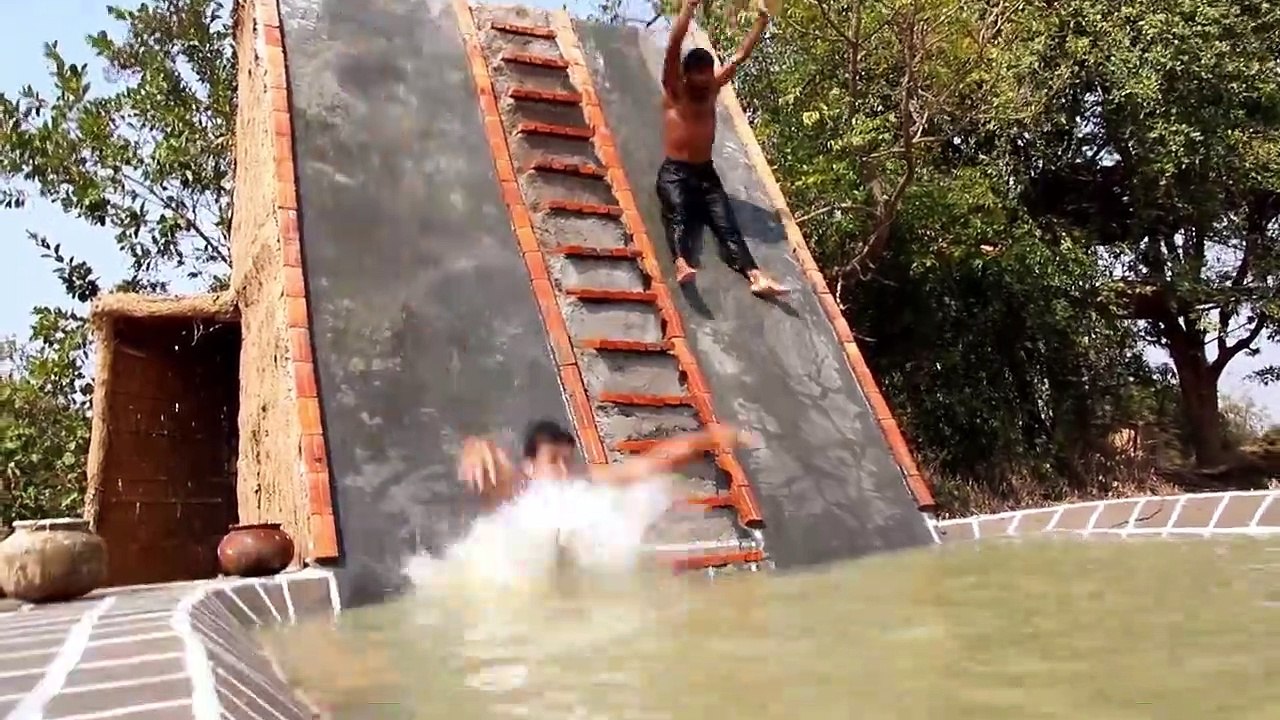 Building Beautiful Swimming Pool In Front Of Water Slide House