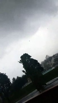 Winds Whip Up Debris Before Tornado Forms