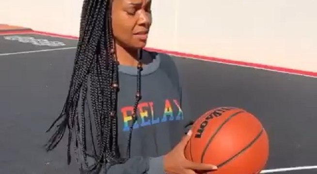 Gabrielle Union makes free throw, while Dwyane Wade tries to throw her off her game