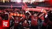 Liverpool fans celebrate club’s historic win