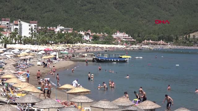 MUĞLA Marmaris'te plajlarda 'iğne atsan yere düşmez'