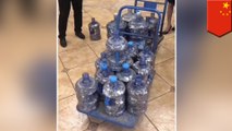 Man pays $21,700 property deposit with bottles of coins