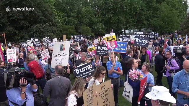 Red Hat Showdown: Trump supporters and protestors scuffle over Trump hat outside Buckingham Palace during presidential visit