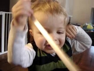 Leo & Lucas playing with reindeer ears