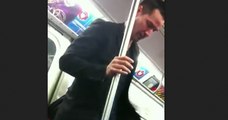 Keanu Reeves gives his seat to a lady on the subway