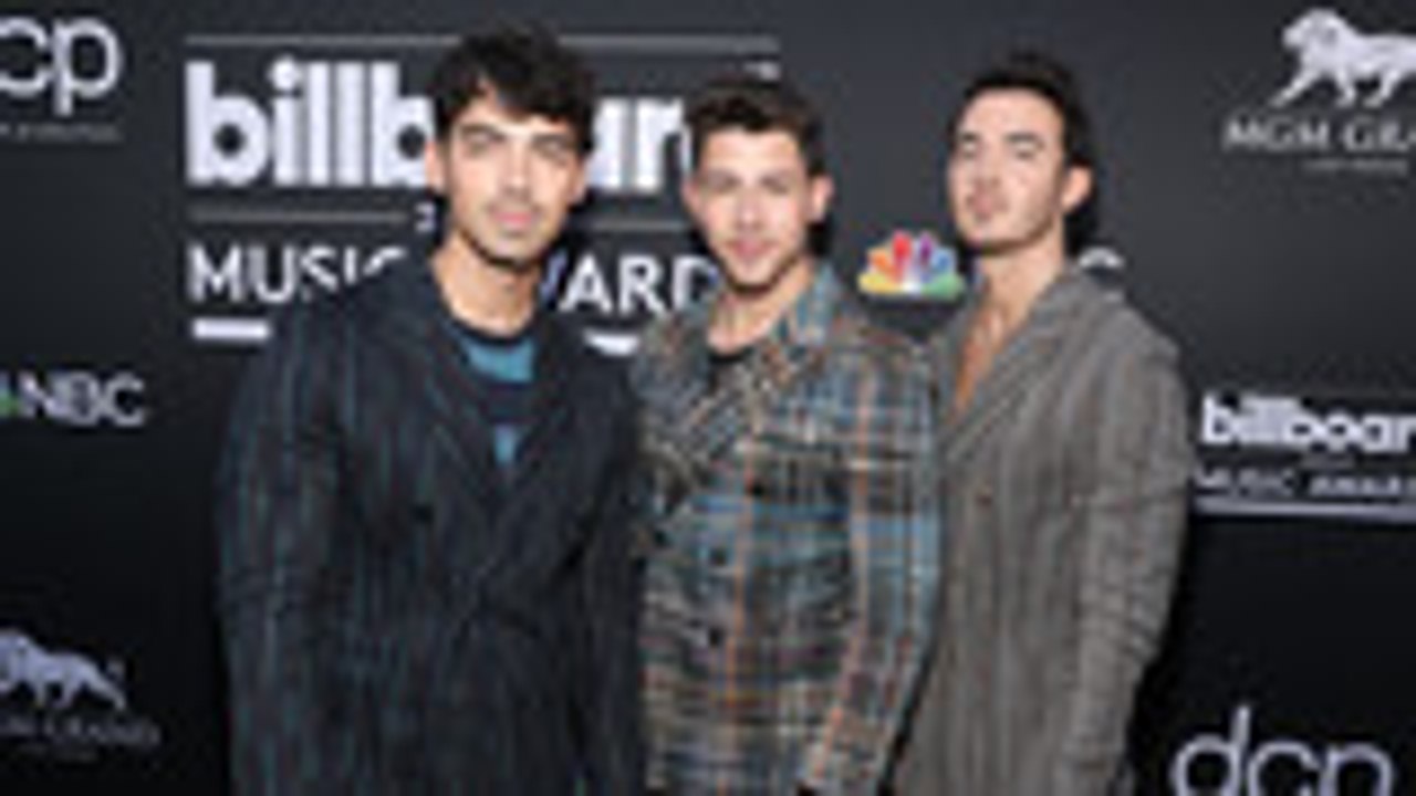 Jonas Brothers Return With First Album In a Decade 'Happiness Begins' | Billboard News