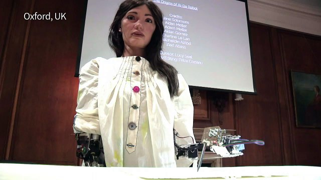 British art dealer unveils pioneering robot artist