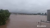 Arkansas River swells in the midst of heavy rain and flooding