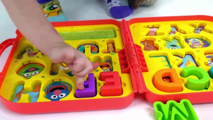 Genevieve Teaches kids Alphabet Sounds with a Toy Puzzle!