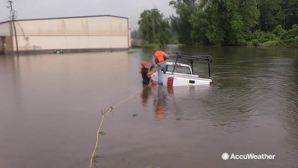Man rescued after driving straight into flooding