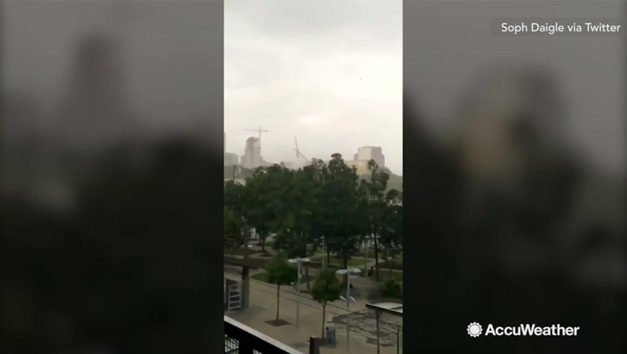 Wind slams crane onto apartment building, killing 1 and injuring 6
