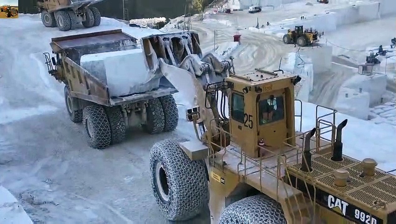 Wheel Loader Loading Marble Blocks On Cat Dumpers - (1)