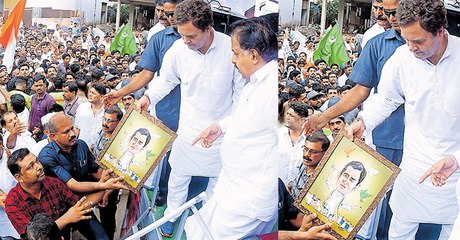 ബഷീര്‍ സമ്മാനിച്ച കാര്‍ട്ടൂണിലെ തന്റെ മുഖം കണ്ട് പുഞ്ചിരിച്ച് രാഹുല്‍