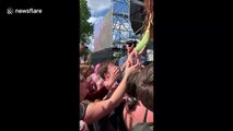 Singer Kate Nash crowd surfs on top of fans at London Mighty Hoopla festival