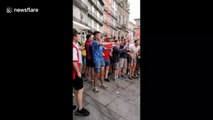 England fans sing with busker in Porto and receive guard of honour from locals