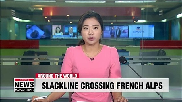 Defying gravity: thrill-seekers brave slackline in the French Alps