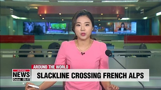 Defying gravity: thrill-seekers brave slackline in the French Alps