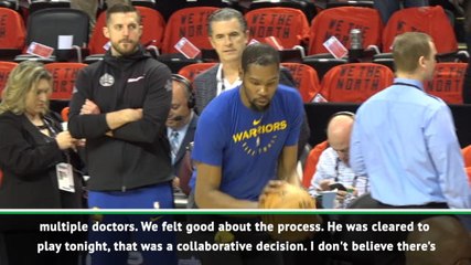 Tearful Warriors GM defends decision to play Durant after injury