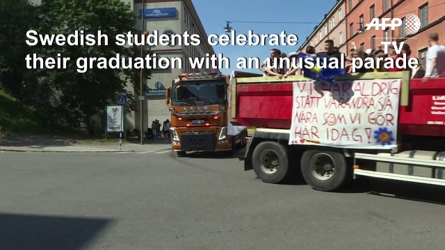 High school graduates parade around Stockholm