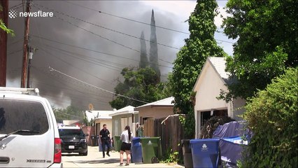 LAFD fights flames at a Reseda home