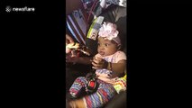 Cute hungry baby excited to try her first rib