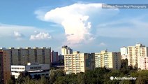 Billowing storm explodes in the distance