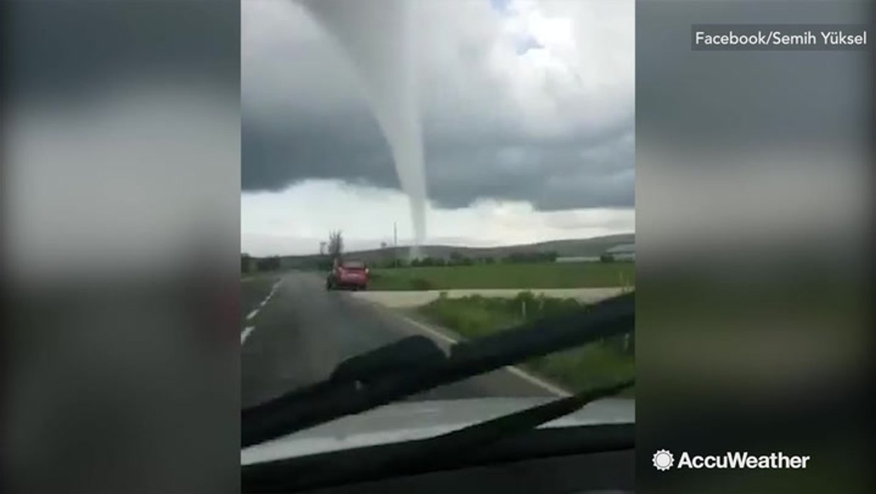 Stunning cone tornado tears across field in Turkey