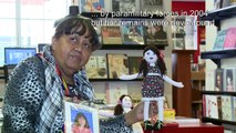 Colombian war victim makes dolls to heal her own pain