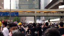 Police fire tear gas from above as protesters gather in Hong Kong