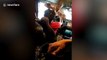Furious wife confronts 'cheating' bus driver husband on the job in front of shocked passengers in the Philippines