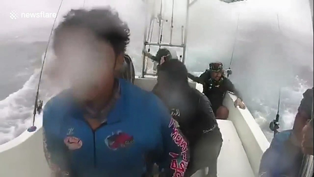 Thai fishermen battle through raging seas