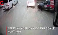 kıntıya kapılıp, aracın altına sürüklenen çocuğu son anda kurtardı