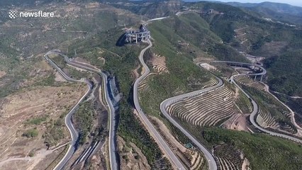 Spectacular drone footage of 3-storey highway built along China's Tianlong Mountain
