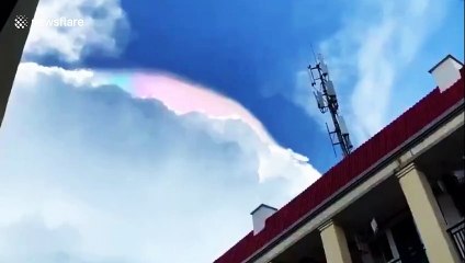 Colourful cloud appeared in sky above Chinese city after rain