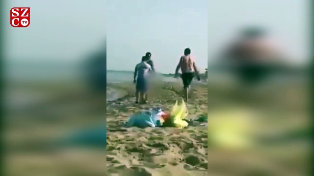 Plajda denize çıplak girmek isteyen sığınmacı pes dedirtti!