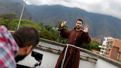 Venezuela's Instagram priest joins anti-Maduro protesters to 'be with the people'