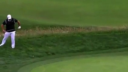 Golf - US Open - Patrick Reed snaps the club over his knee