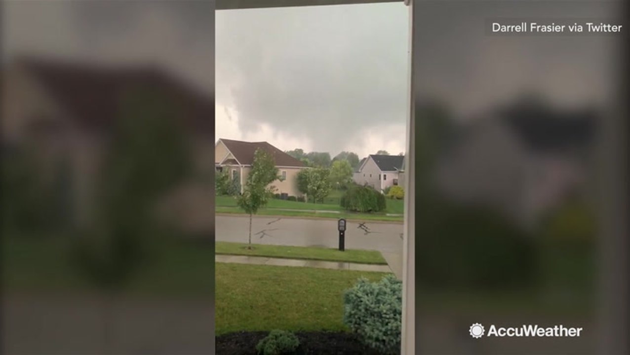 Tornado touches down among homes